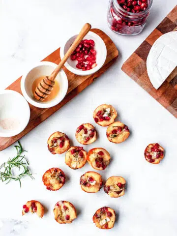 overhead image of pomegranate rosemary brie bites